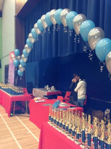 Balloon-arch-over-dance-trophies (1)